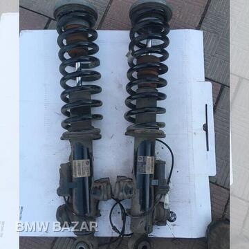 Бмв f03 задние амортизаторы EDC